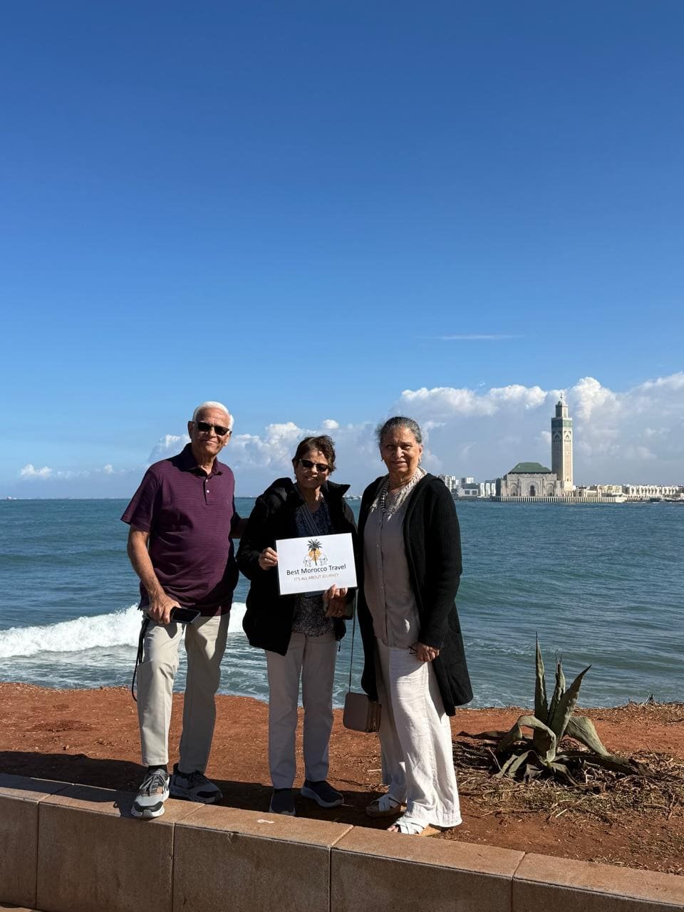 Guests on the seafront by the Hassan II Mosque, Casablanca